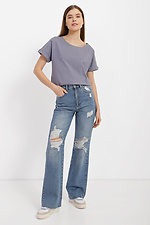 High-rise blue jeans with a rip  4014621 photo №2