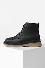 Hohe Plateaustiefel aus schwarzem Leder  4205626 Foto №2
