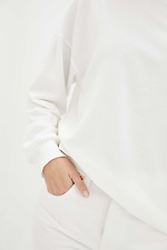 Біла трикотажна кофта MAYA з довгими рукавами та відкритим плечем Garne 3037664 фото №4