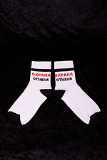 Weiße hohe Baumwollsocken mit der Aufschrift Sicherheitsstempel Without 8042724 Foto №2