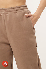 Insulated sweatpants with fleece in beige color with cuffs Garne 3039730 photo №4