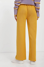 Women's knitted trousers in mustard color  4038789 photo №3