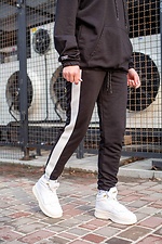 Black tracksuit with white stripes Without 8042813 photo №2