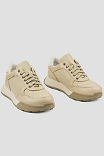 Beige Ledersneaker mit perforierter Plateausohle für Damen 4205854 Foto №1