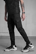 Чорні коттонові штани карго з великими кишенями з боків Without 8048921 фото №1