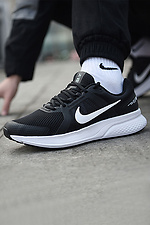 Черные кроссовки Nike для мужчин с белой подошвой Nike 4101929 фото №4